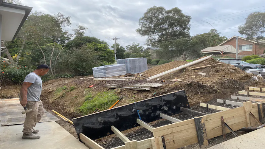 Landscaping a front yard in Montmorency, Melbourne with new steps and retaining wall