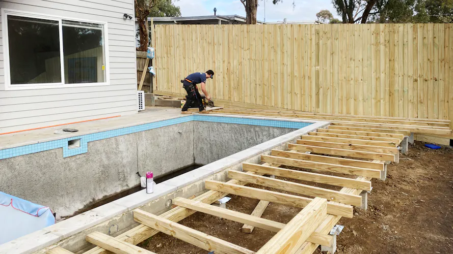 Landscaping a backyard pool area in Montmorency, Melbourne