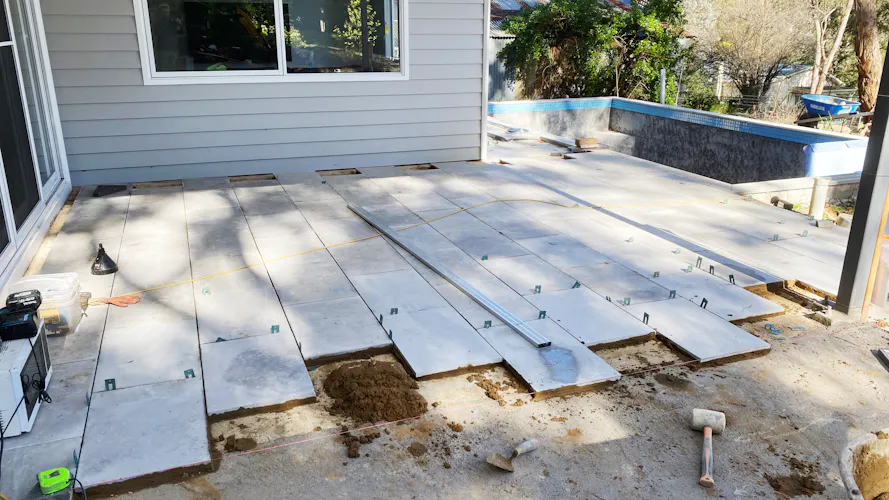 Landscaping a backyard in Montmorency, Melbourne with paving alfresco area