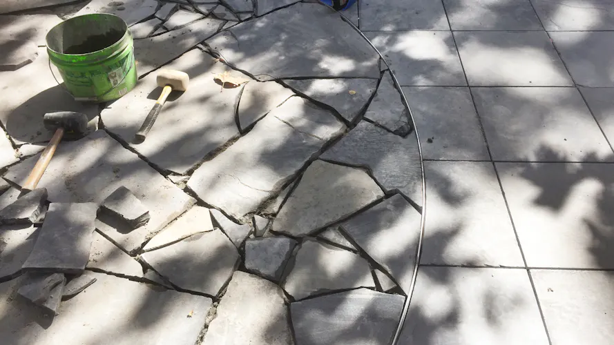 Toorak, Melbourne front yard and entrance area landscaping work including circular paved areas being constructed