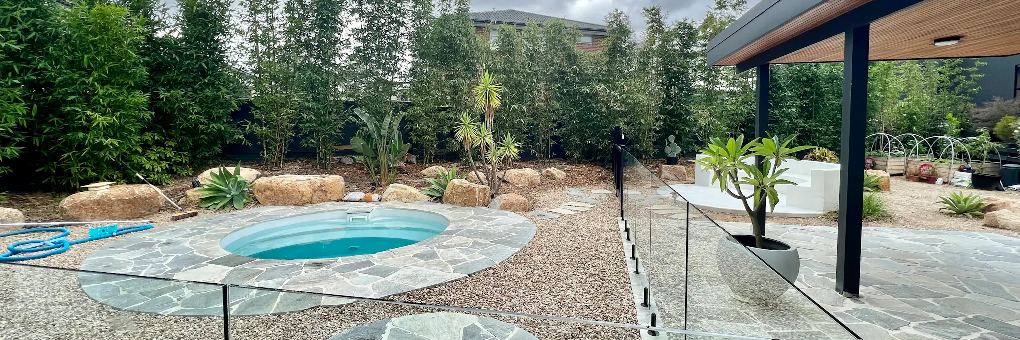Backyard landscaping in Doncaster completed with Palm Springs style by Land Sculpture